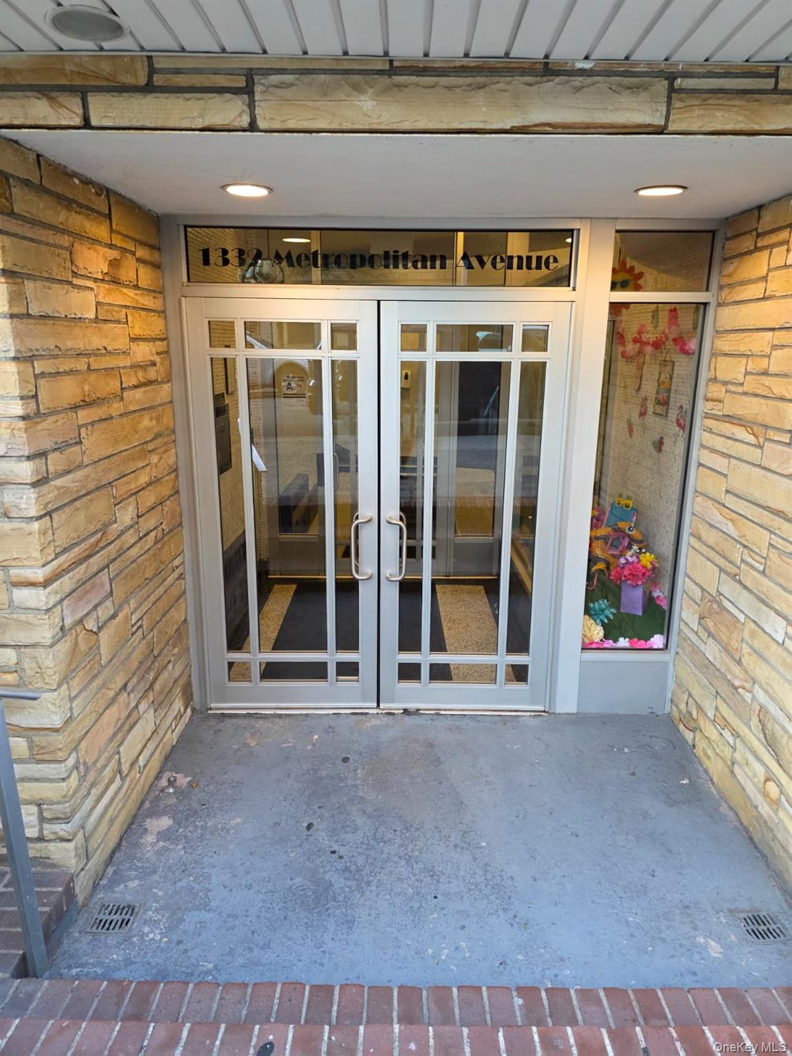 a view of a door with glass windows