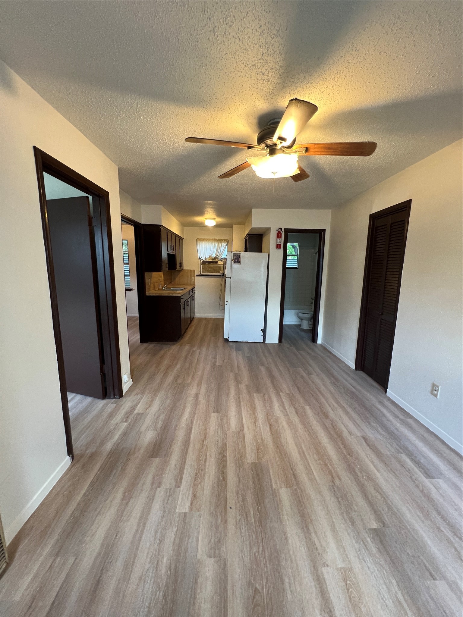 2501 Cleburne Street, Unit 1 Houston, TX 77004 - Photo 1 of 7 a view of a hallway view with wooden floor and staircase