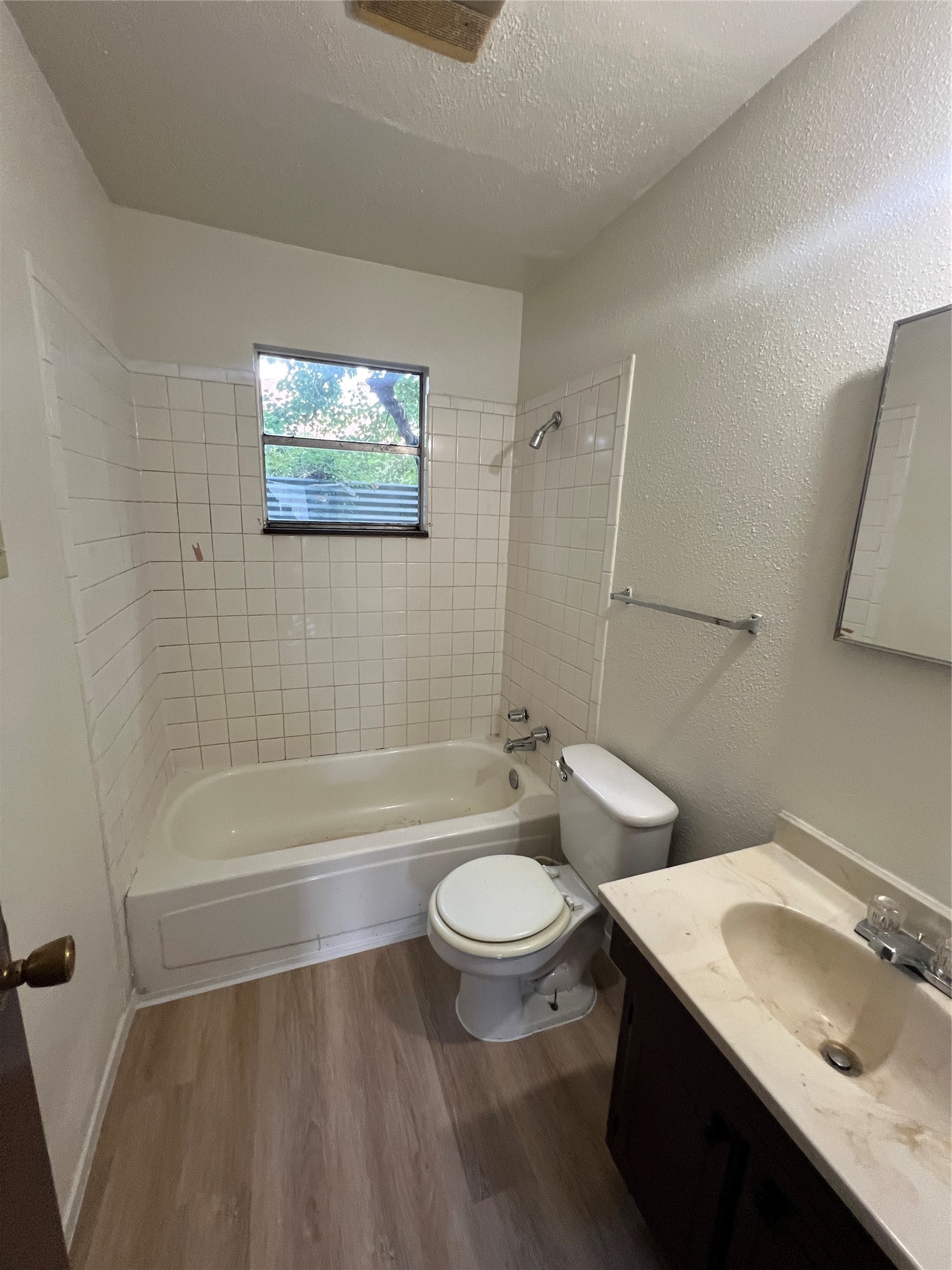 2501 Cleburne Street, Unit 1 Houston, TX 77004 - Photo 7 of 7 a bathroom with a sink a toilet and a bathtub