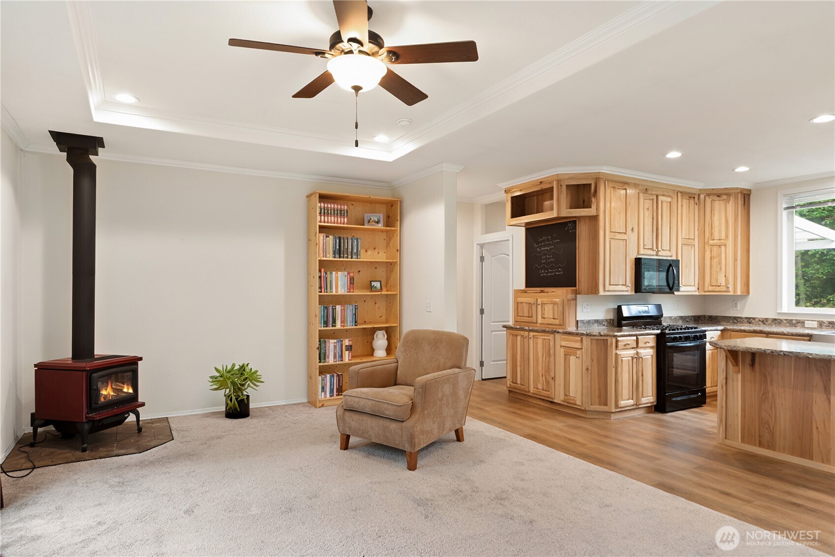 290 Werner Road Port Ludlow, WA 98365 - Photo 11 of 40 a living room with furniture and a flat screen tv