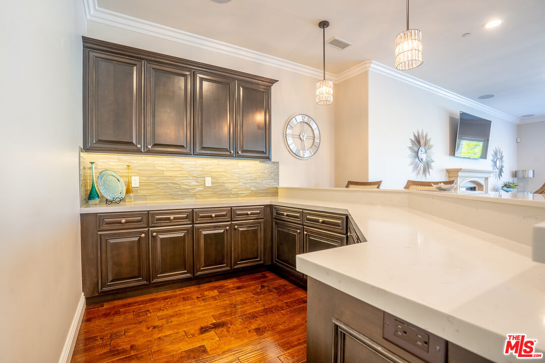 2510 Belleview Road Upland, CA 91784 - Photo 12 of 75 a kitchen with stainless steel appliances granite countertop a stove a sink and a refrigerator