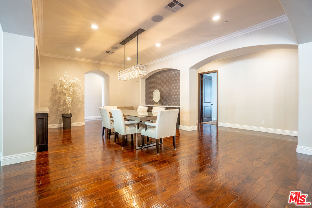 2510 Belleview Road Upland, CA 91784 - Photo 13 of 75 a view of a dining room with furniture and wooden floor