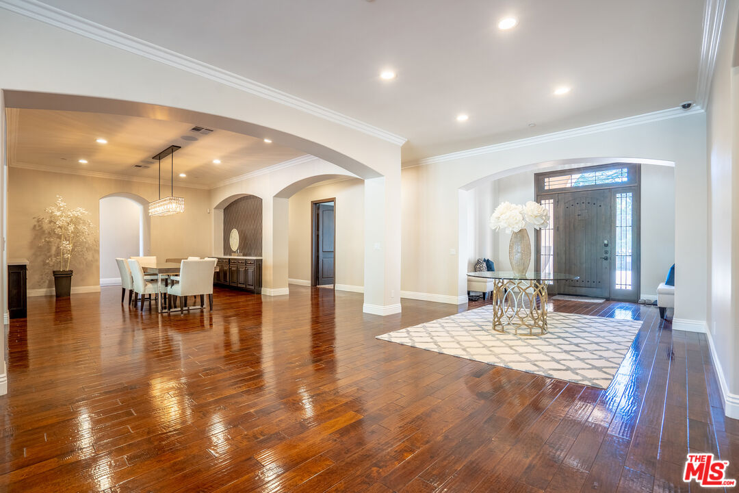 2510 Belleview Road Upland, CA 91784 - Photo 15 of 75 a living room with dining room and wooden floor