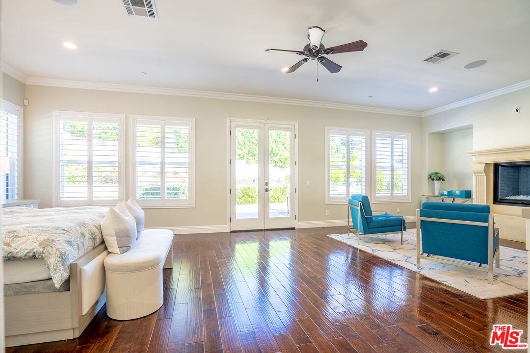 2510 Belleview Road Upland, CA 91784 - Photo 49 of 75 a living room with furniture fireplace and a large window