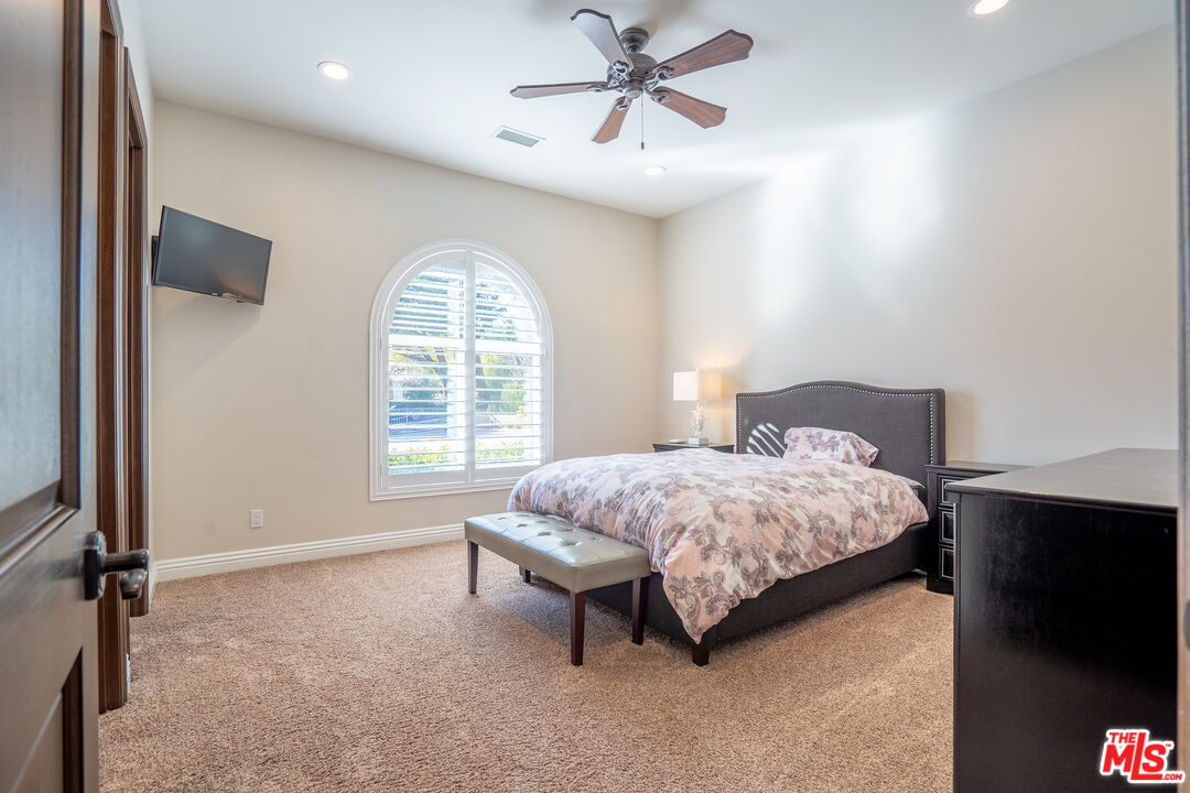 2510 Belleview Road Upland, CA 91784 - Photo 50 of 75 a bedroom with a bed and a window