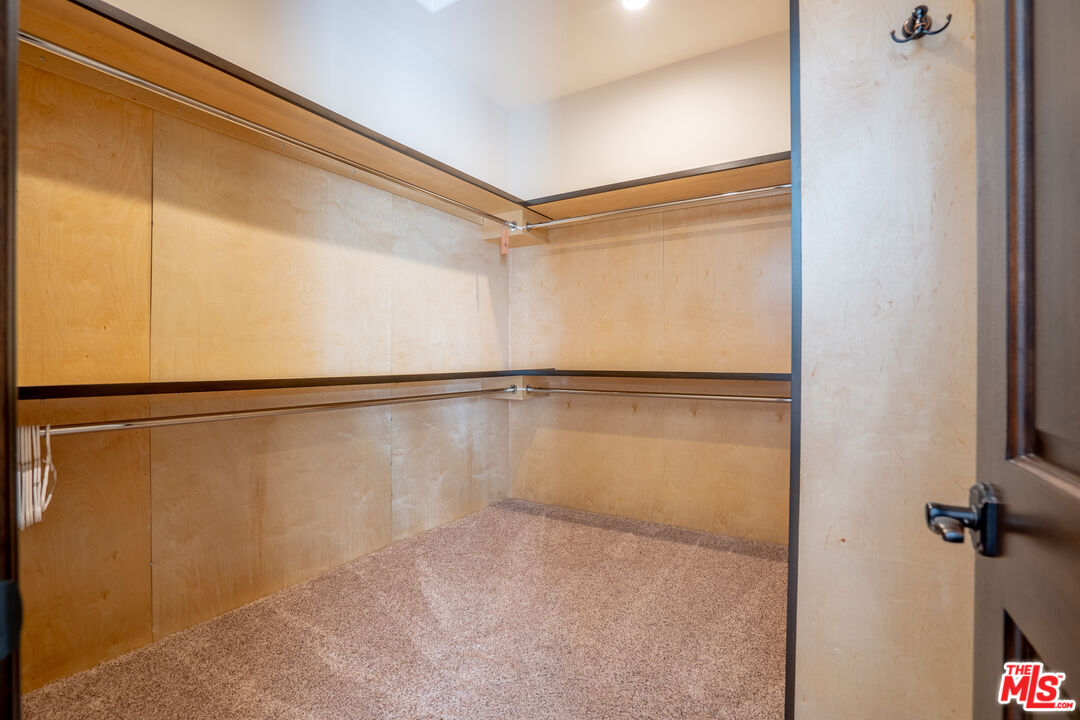 2510 Belleview Road Upland, CA 91784 - Photo 52 of 75 a bathroom with a shower and a glass door