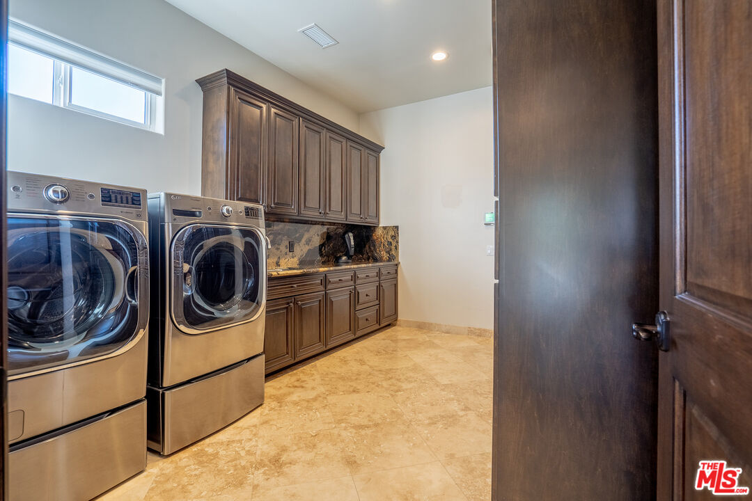 2510 Belleview Road Upland, CA 91784 - Photo 68 of 75 a utility room with dryer and washer