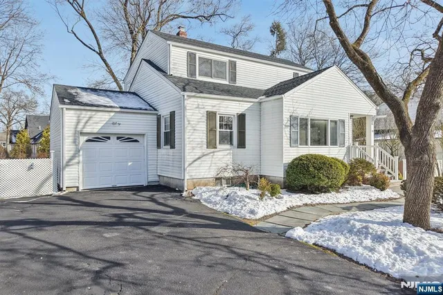 a view of a house with snow on the wall