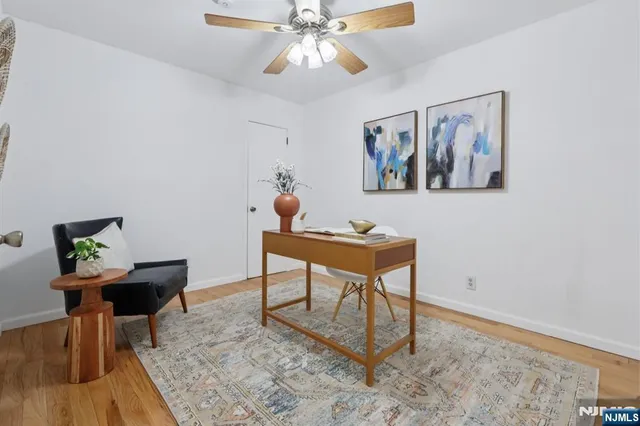 a view of a workspace with furniture