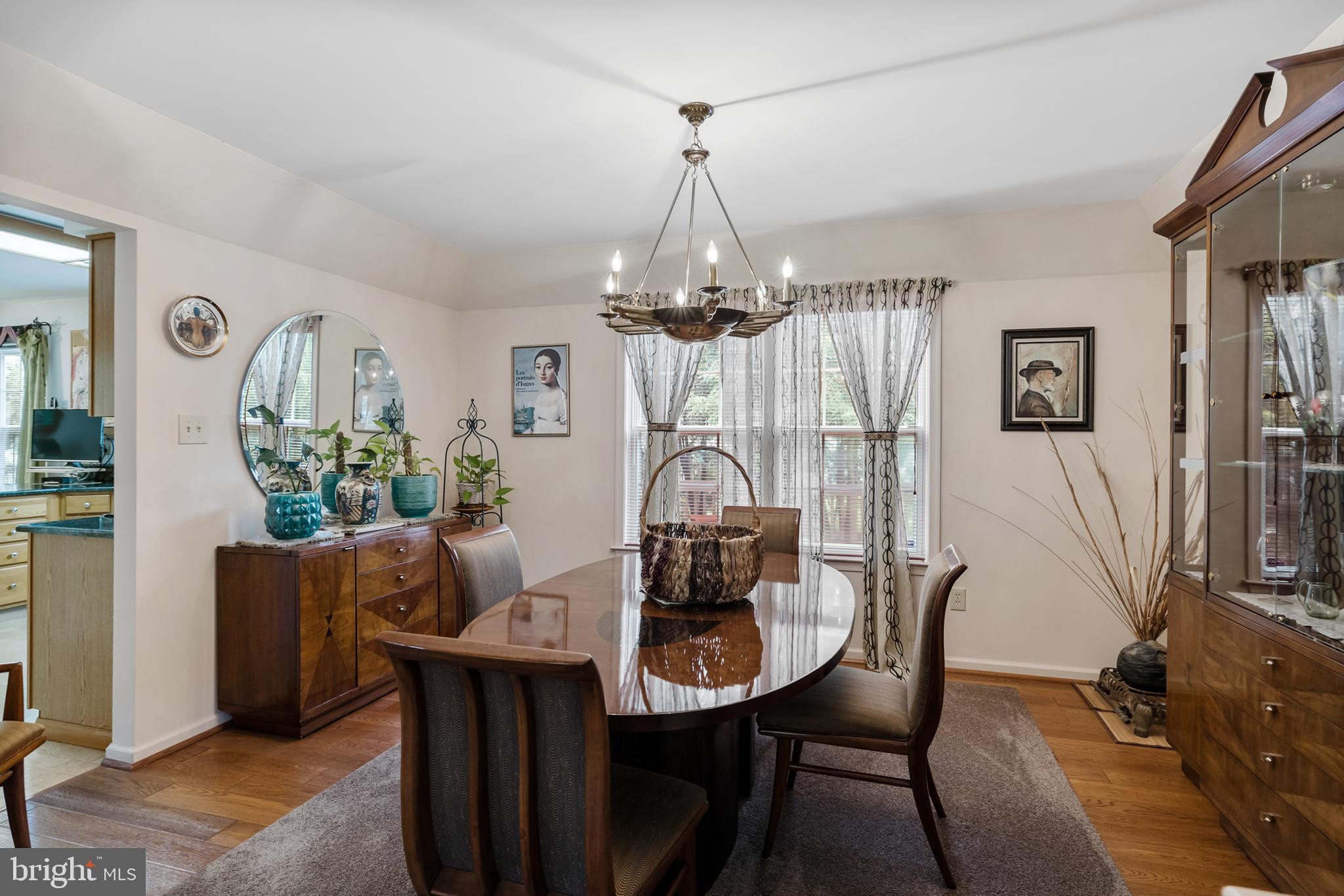 10 Tansgate Boulevard Berlin, NJ 08009 - Photo 12 of 51 a view of a dining room with furniture and chandelier
