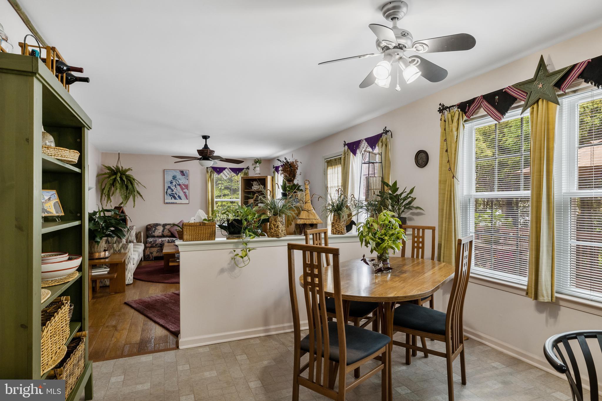 10 Tansgate Boulevard Berlin, NJ 08009 - Photo 17 of 51 a view of a dining room with furniture window and outside view