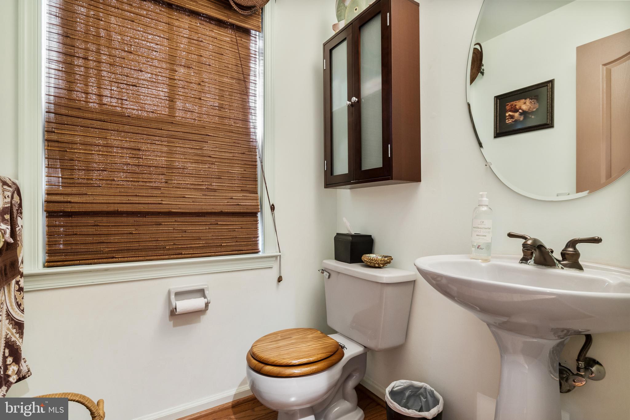 10 Tansgate Boulevard Berlin, NJ 08009 - Photo 22 of 51 a bathroom with a toilet a sink and a mirror