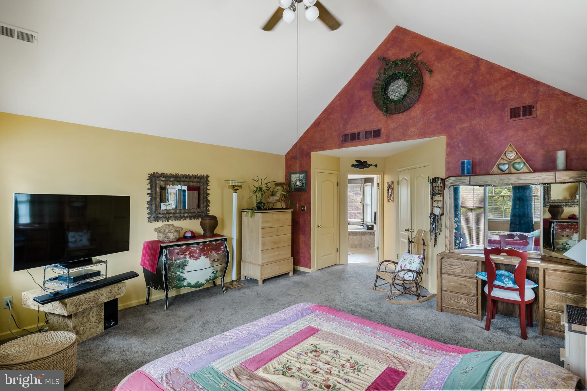 10 Tansgate Boulevard Berlin, NJ 08009 - Photo 25 of 51 a living room with furniture and a flat screen tv