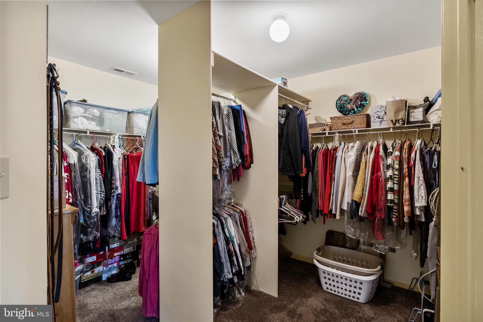 10 Tansgate Boulevard Berlin, NJ 08009 - Photo 29 of 51 a view of walk in closet with clothes