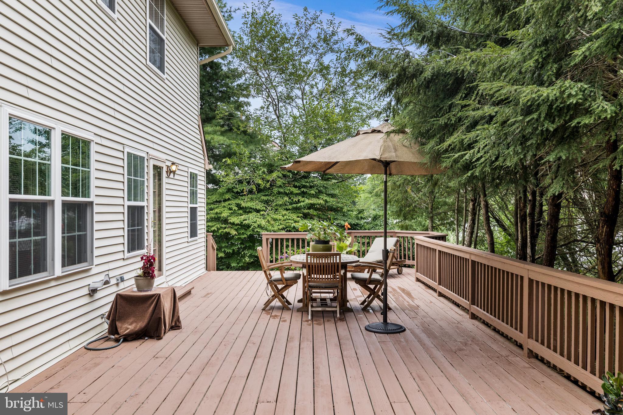 10 Tansgate Boulevard Berlin, NJ 08009 - Photo 45 of 51 a view of a two chairs and table in the balcony