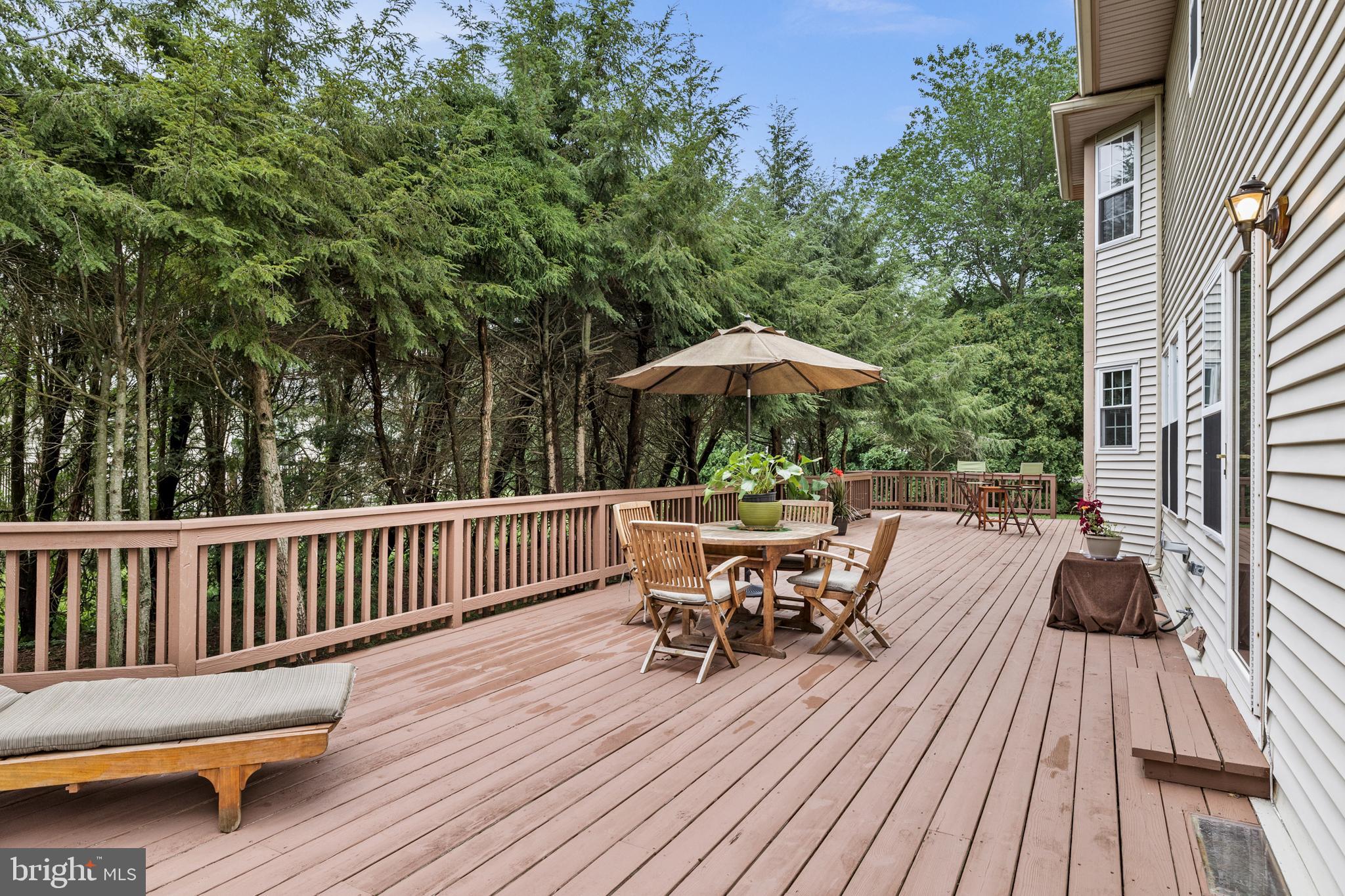 10 Tansgate Boulevard Berlin, NJ 08009 - Photo 47 of 51 a view of backyard with seating space and trees