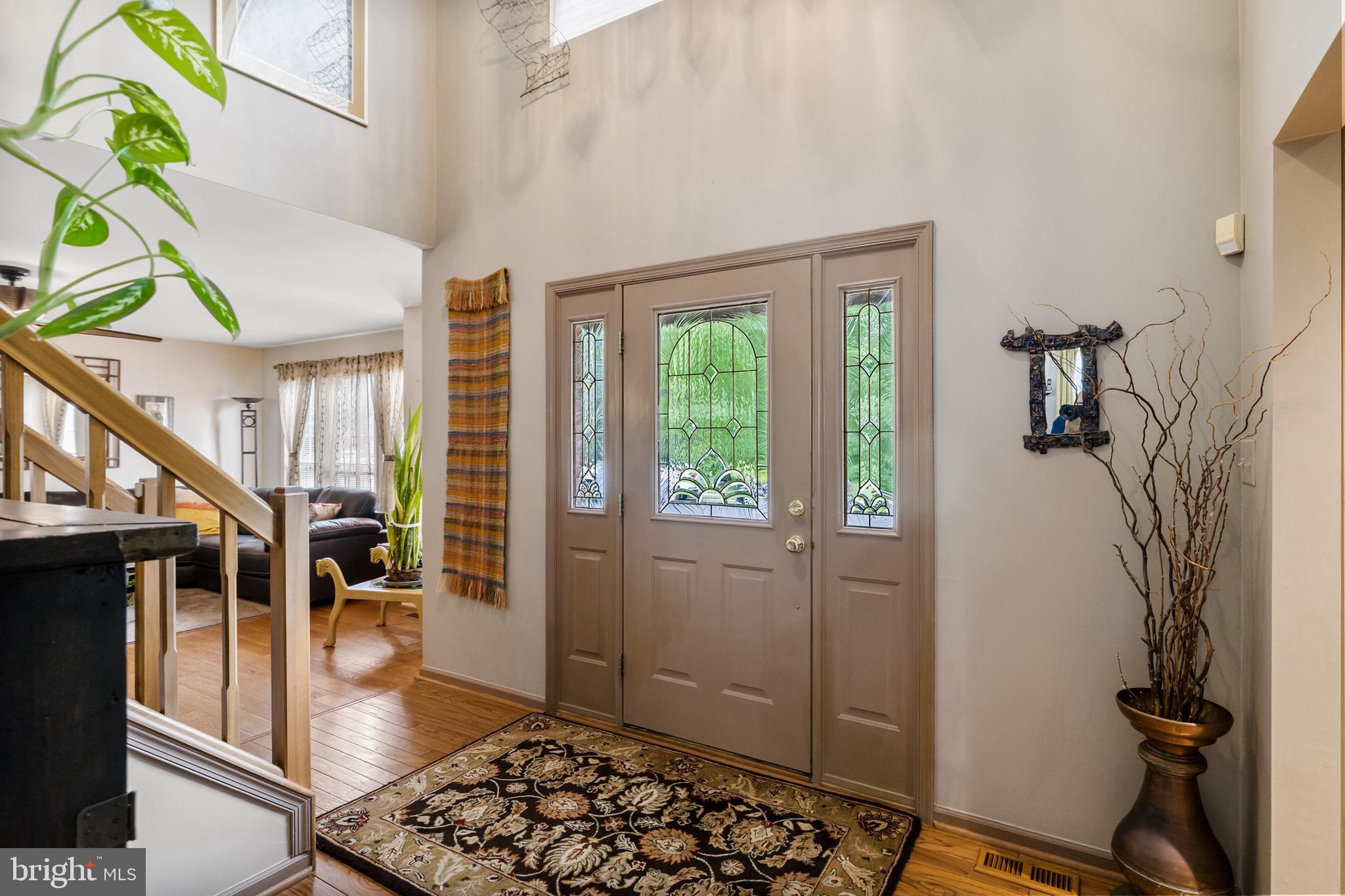 10 Tansgate Boulevard Berlin, NJ 08009 - Photo 6 of 51 a hallway with a dining table and chairs