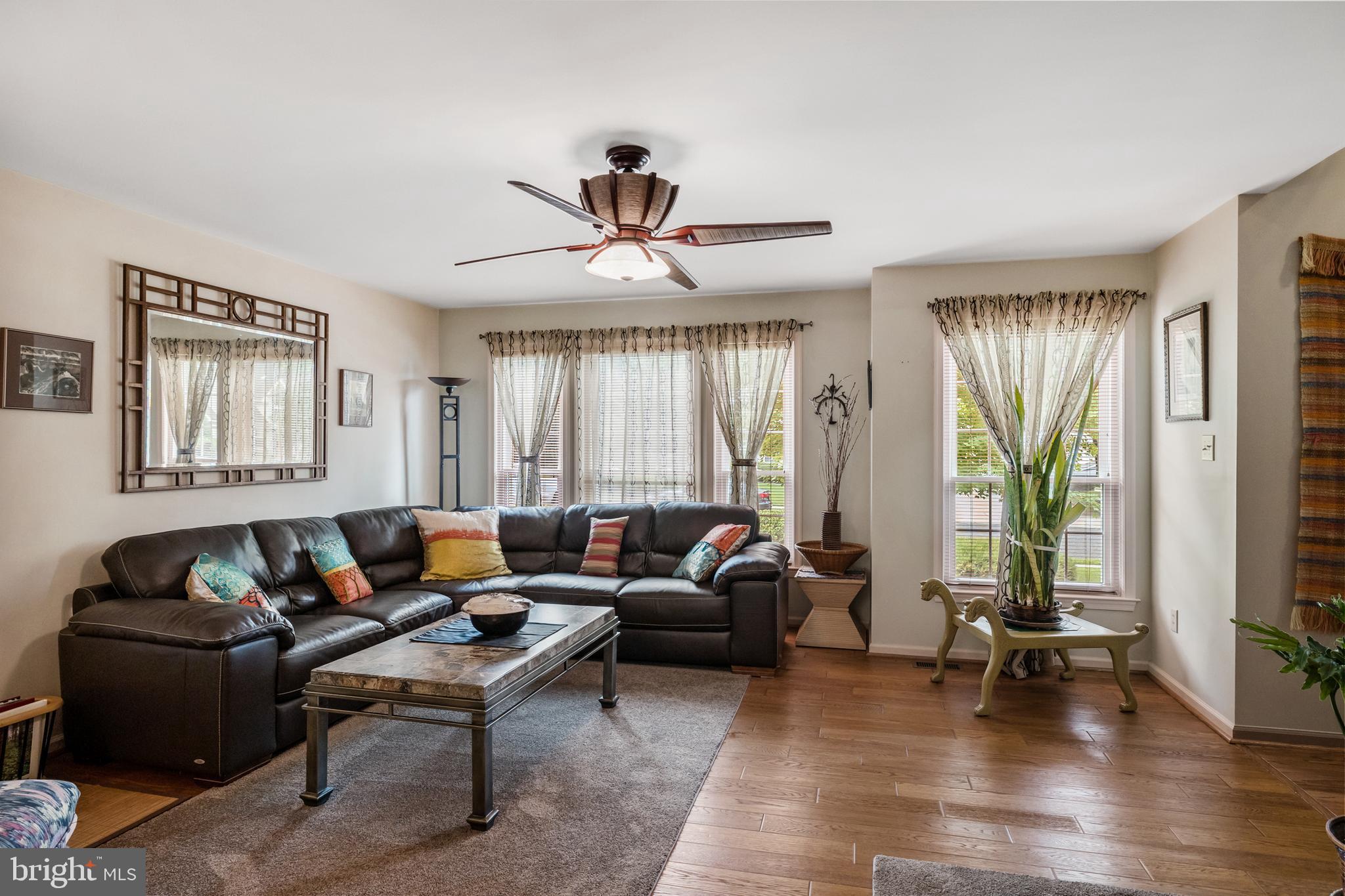 10 Tansgate Boulevard Berlin, NJ 08009 - Photo 9 of 51 a living room with furniture and a large window