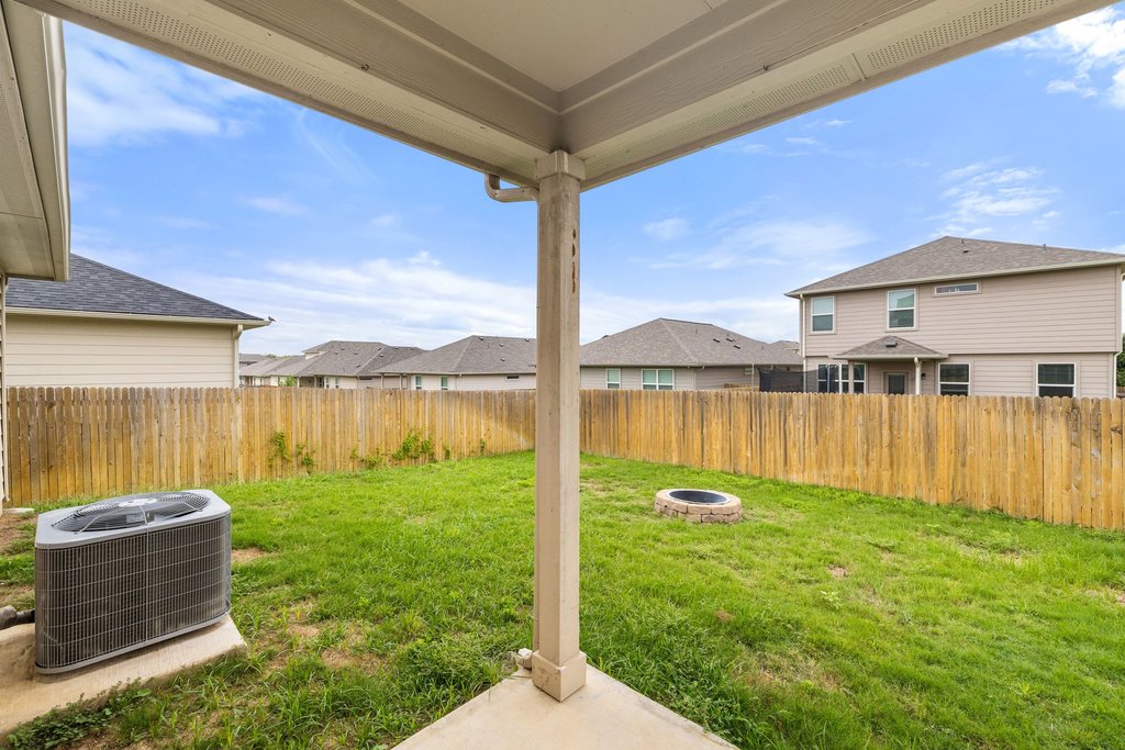 102 Ashford Way Georgetown, TX 78626 - Photo 25 of 28 A well-maintained fenced yard offers a private retreat for outdoor enjoyment and relaxation.