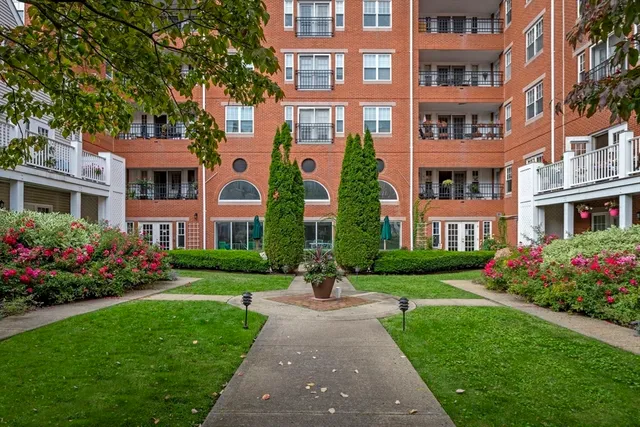 a front view of a multi story residential apartment building