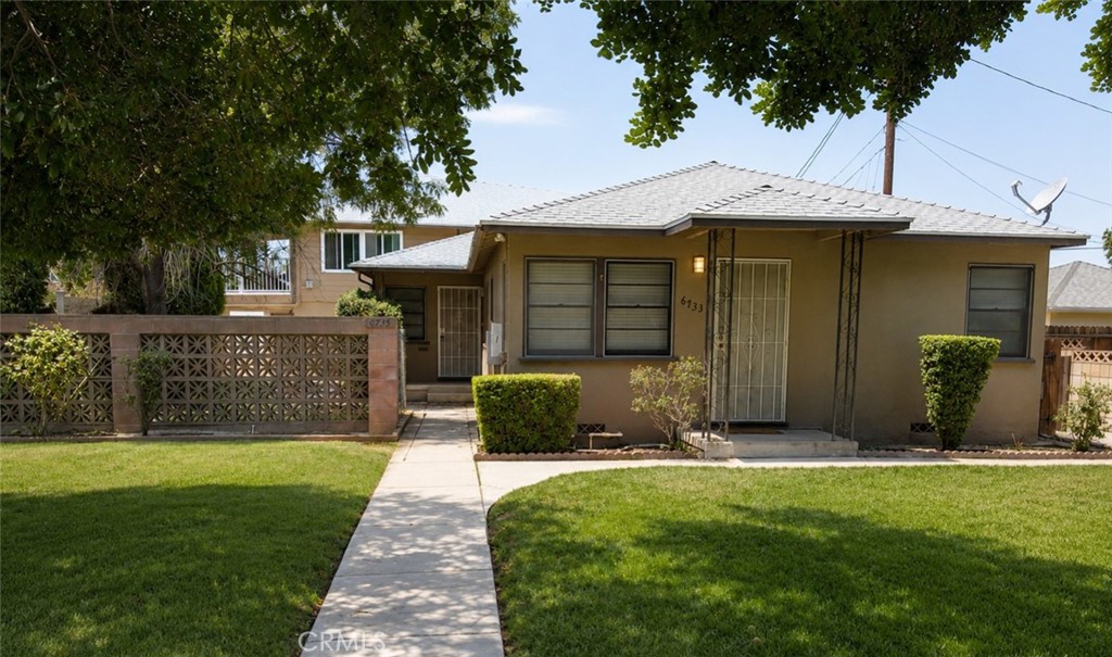 6735 Yellowstone Drive, Unit A Riverside, CA 92506 - Photo 1 of 14 a front view of a house with garden