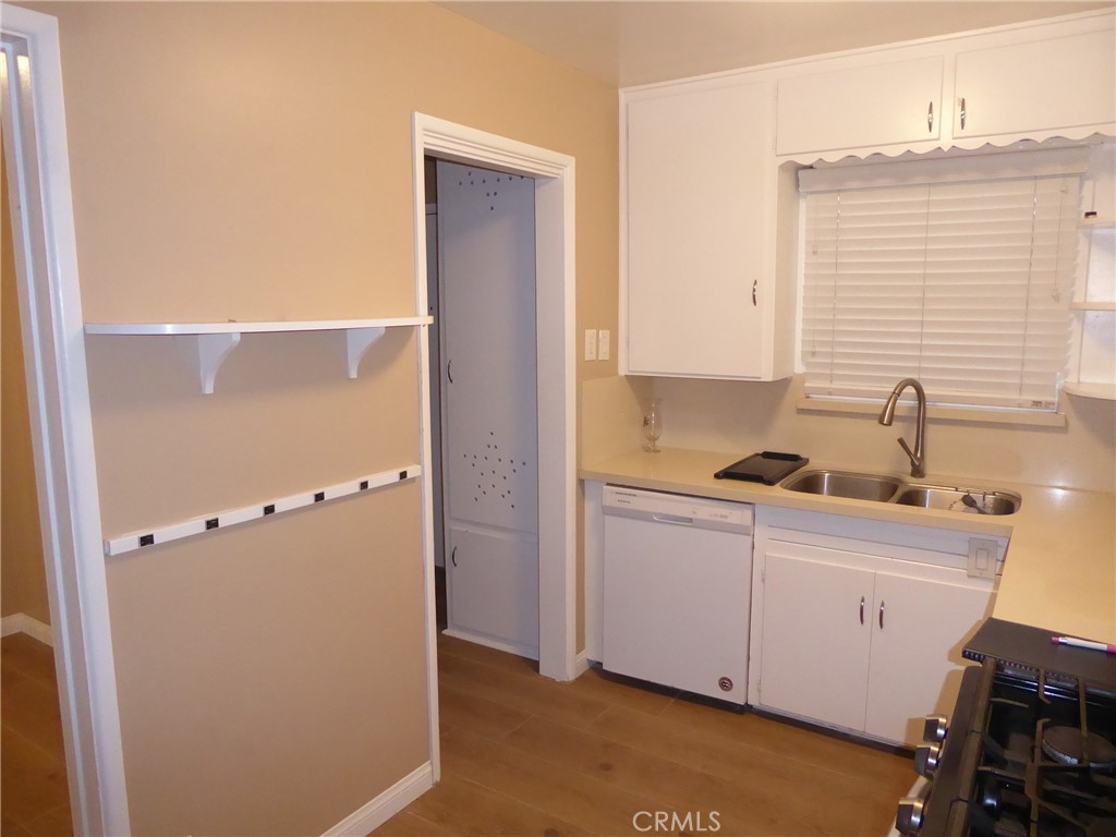 6735 Yellowstone Drive, Unit A Riverside, CA 92506 - Photo 11 of 14 a bathroom with a sink and a mirror