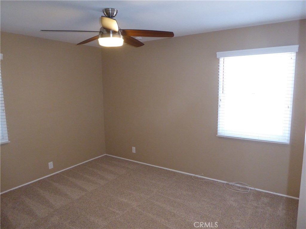 6735 Yellowstone Drive, Unit A Riverside, CA 92506 - Photo 14 of 21 an empty room that has a window