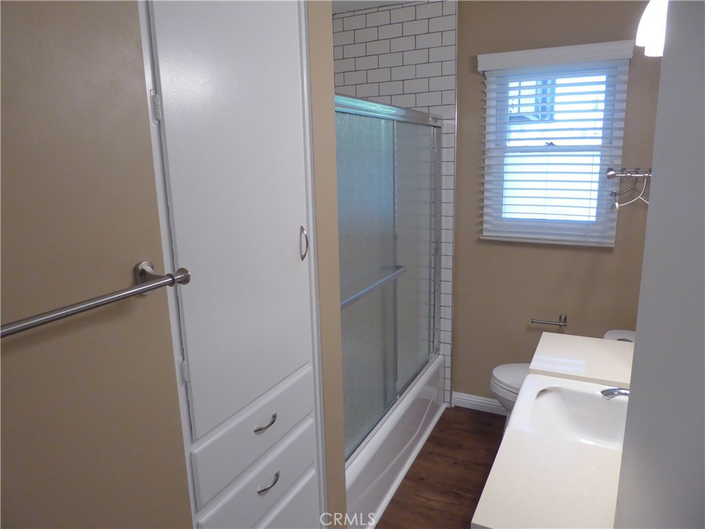 6735 Yellowstone Drive, Unit A Riverside, CA 92506 - Photo 17 of 21 a bathroom with a toilet and a shower