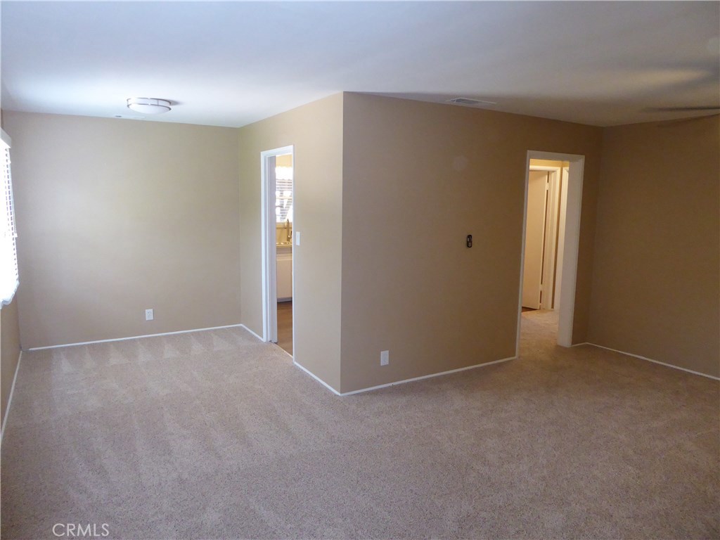 6735 Yellowstone Drive, Unit A Riverside, CA 92506 - Photo 3 of 21 a view of an empty room and window