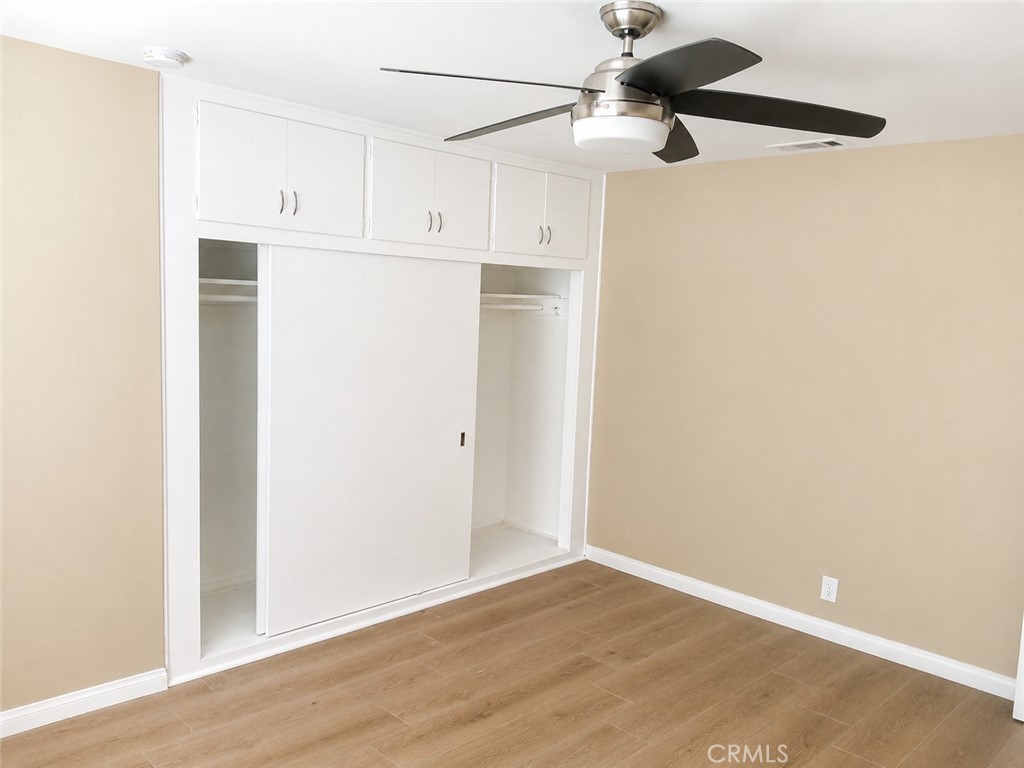 6735 Yellowstone Drive, Unit A Riverside, CA 92506 - Photo 8 of 14 a view of cabinets and wooden floor
