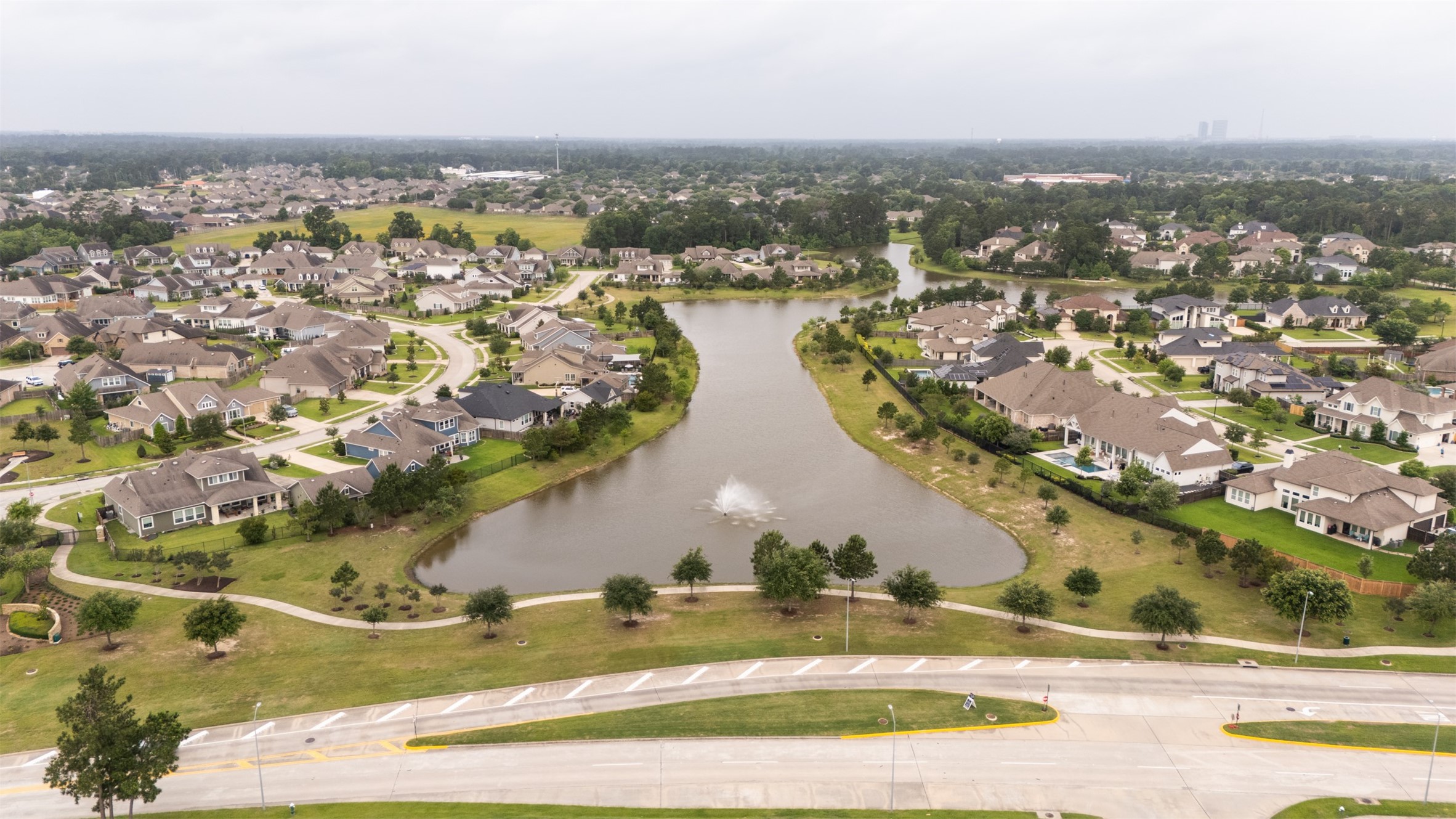 31032 Sunfall Trail Lane Spring, TX 77386 - Photo 37 of 39 an aerial view of residential houses with outdoor space