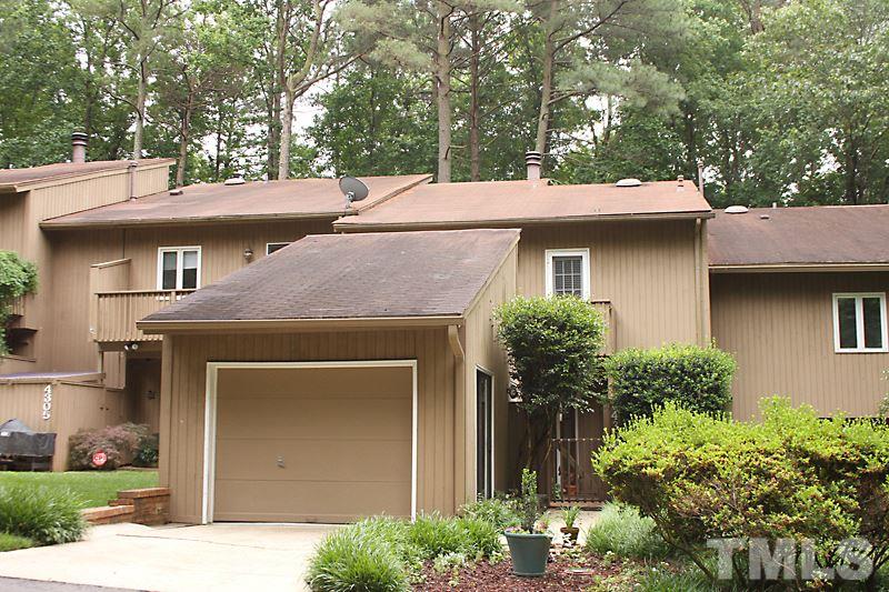4307 Sun Belt Place Raleigh, NC 27613 - Photo 1 of 11 a front view of a house with garden
