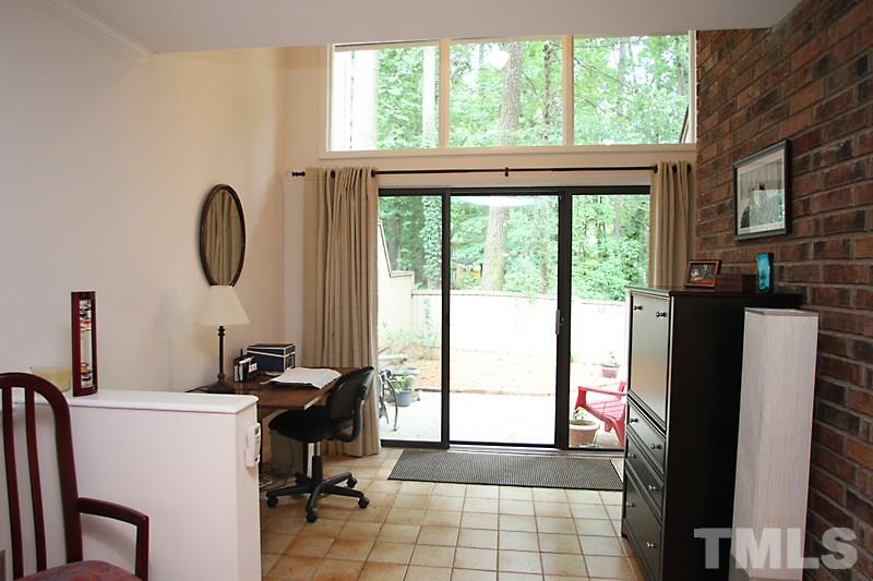 4307 Sun Belt Place Raleigh, NC 27613 - Photo 5 of 11 a view of a workspace with furniture and a window