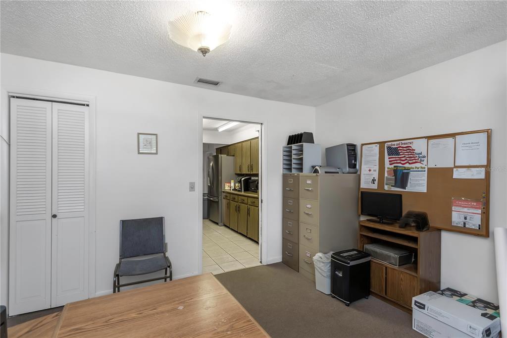 17515 Lakeshore Road Lutz, FL 33558 - Photo 28 of 61 a view of a livingroom with furniture and an empty room