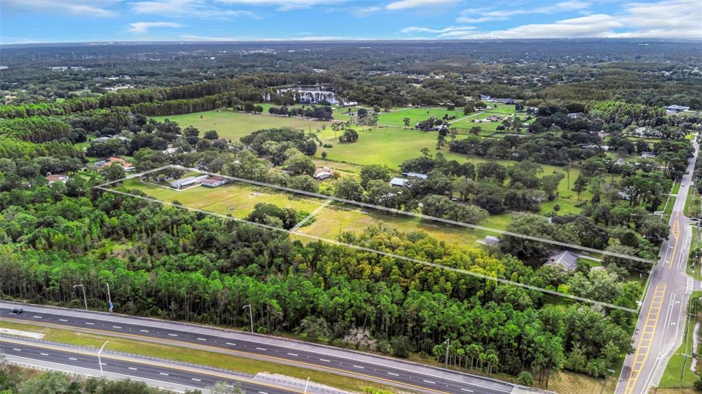 17515 Lakeshore Road Lutz, FL 33558 - Photo 55 of 61 a view of a city with lake view