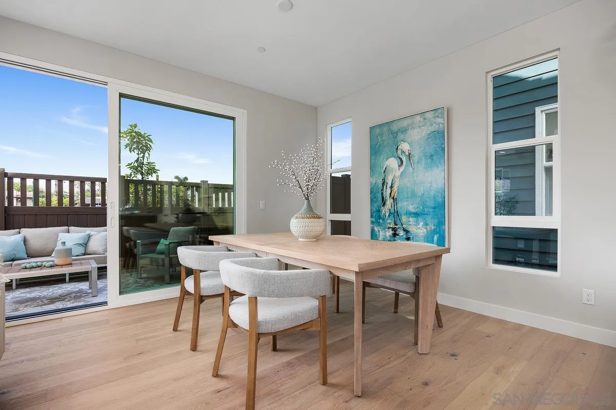 559 North Vulcan Avenue Encinitas, CA 92024 - Photo 11 of 50 a view of a dining room with furniture window and wooden floor