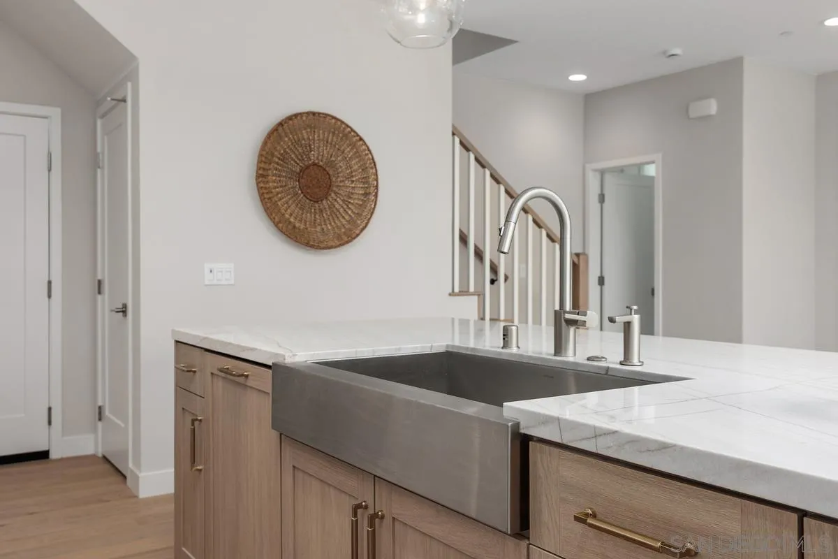 559 North Vulcan Avenue Encinitas, CA 92024 - Photo 15 of 50 a bathroom with a sink and a mirror