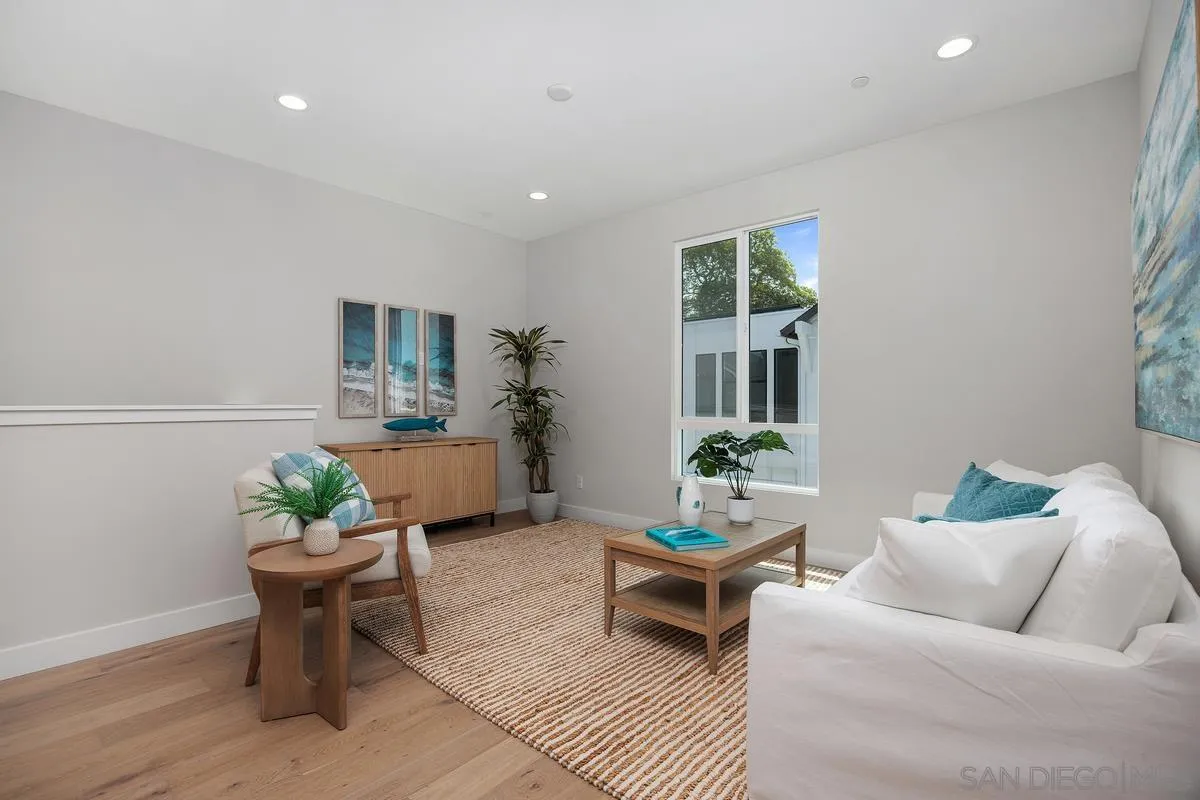 559 North Vulcan Avenue Encinitas, CA 92024 - Photo 21 of 50 a living room with furniture and a potted plant
