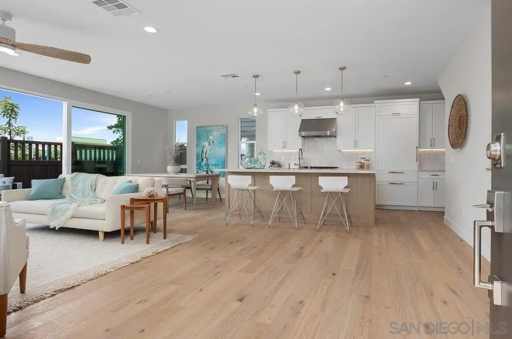 559 North Vulcan Avenue Encinitas, CA 92024 - Photo 5 of 50 a living room with furniture and a wooden floor