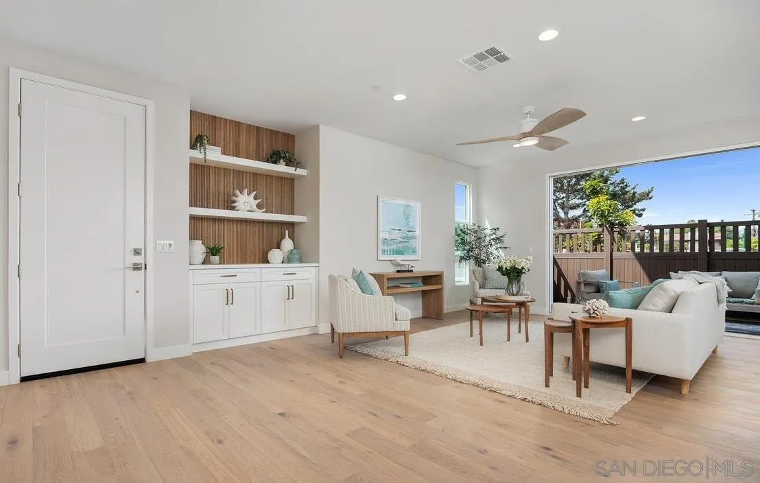 559 North Vulcan Avenue Encinitas, CA 92024 - Photo 6 of 50 a living room with furniture and a book shelf