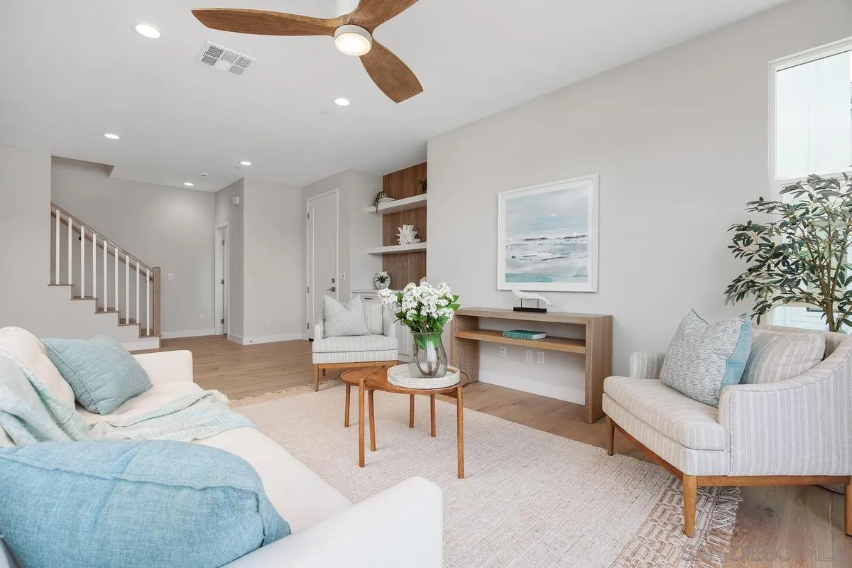 559 North Vulcan Avenue Encinitas, CA 92024 - Photo 8 of 50 a living room with furniture and a potted plant