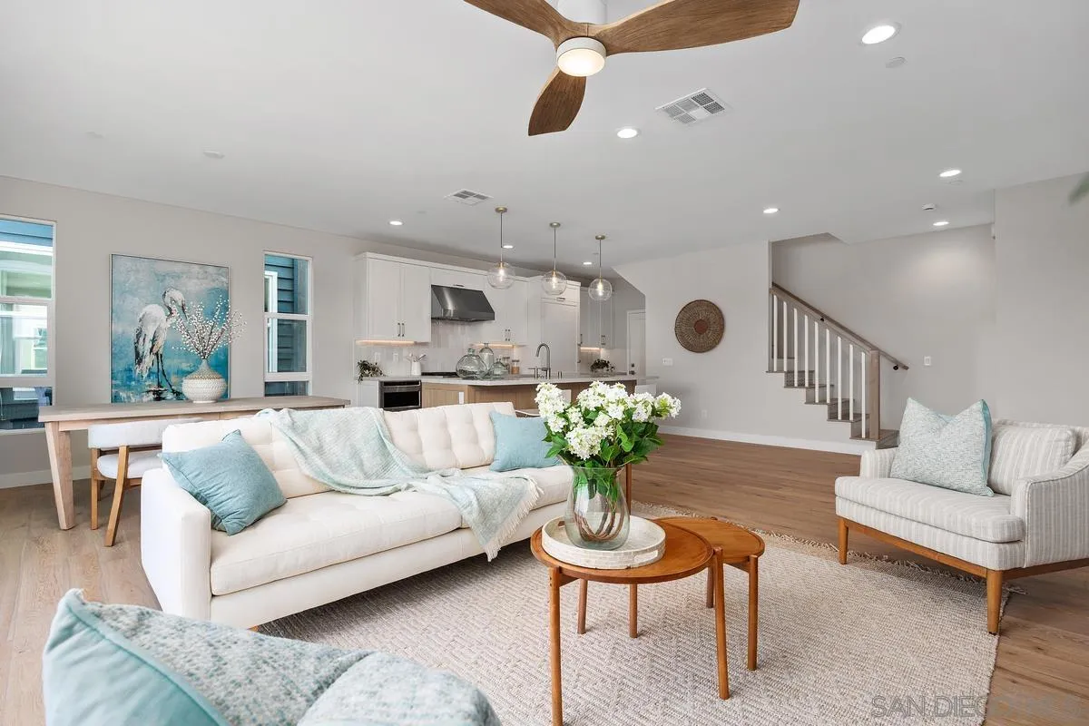559 North Vulcan Avenue Encinitas, CA 92024 - Photo 9 of 50 a living room with furniture potted plant and kitchen view