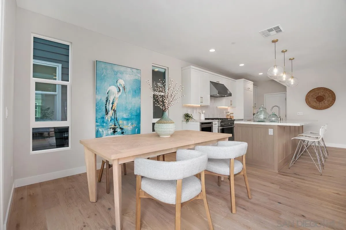 559 North Vulcan Avenue Encinitas, CA 92024 - Photo 10 of 50 a view of a dining room with furniture window and wooden floor