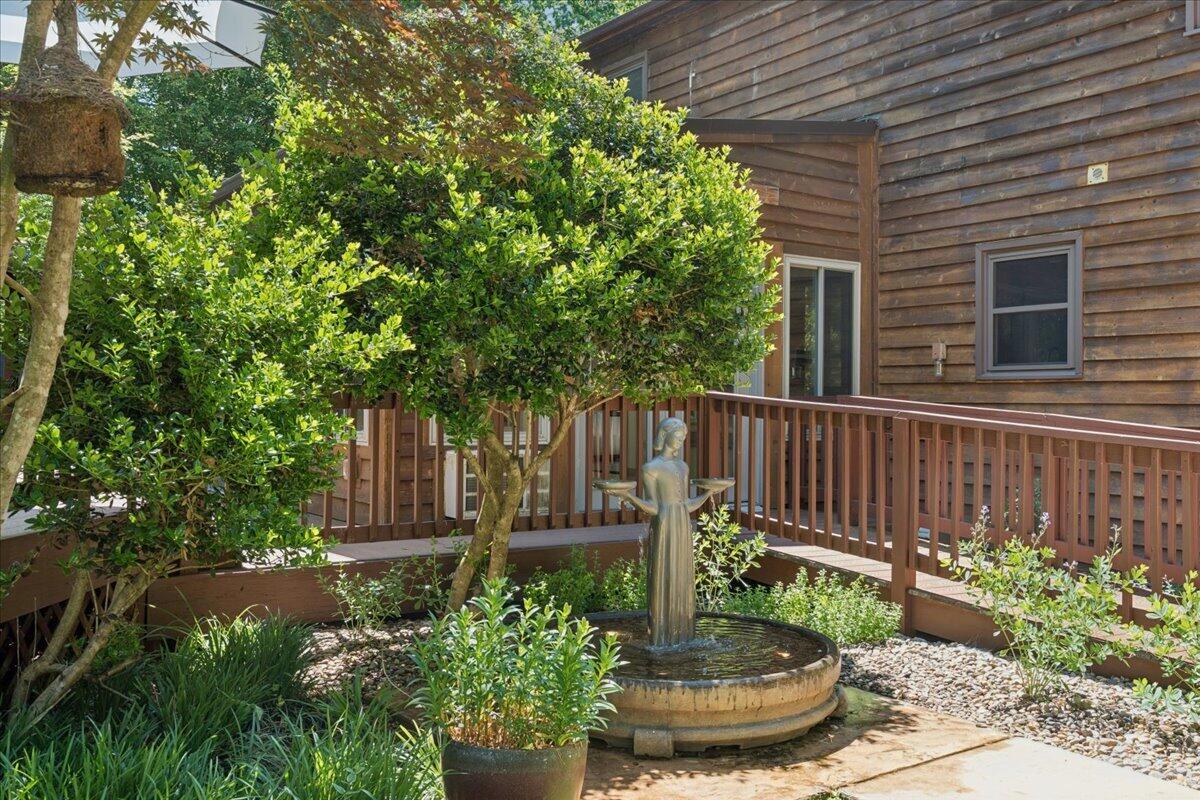 431 Langdon Road Evington, VA 24550 - Photo 36 of 54 a view of a house with a small yard plants and large tree