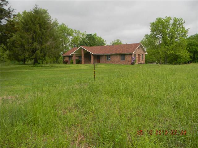499 Buck Perry Road Bethpage, TN 37022 - Photo 1 of 19 Renovated home with most everything brand new!! Replacement windows (except 2) New HVAC, New Wood look floors, Carpet, Paint!!! Just like brand new!! All Brick, Ranch on 26.23 Acres!!!