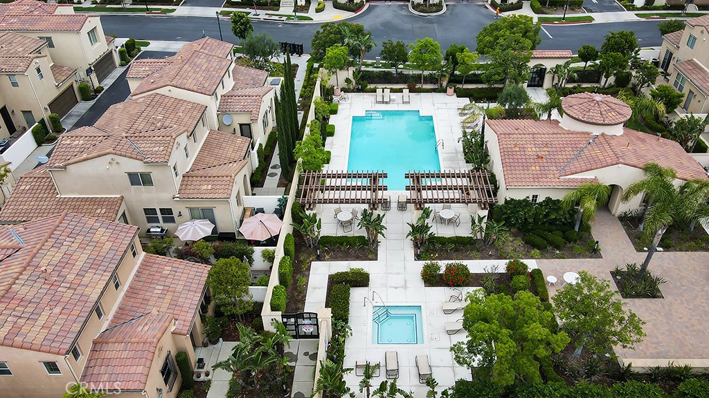 20317 Livorno Porter Ranch Porter Ranch, CA 91326 - Photo 29 of 33 an aerial view of multiple houses with outdoor space