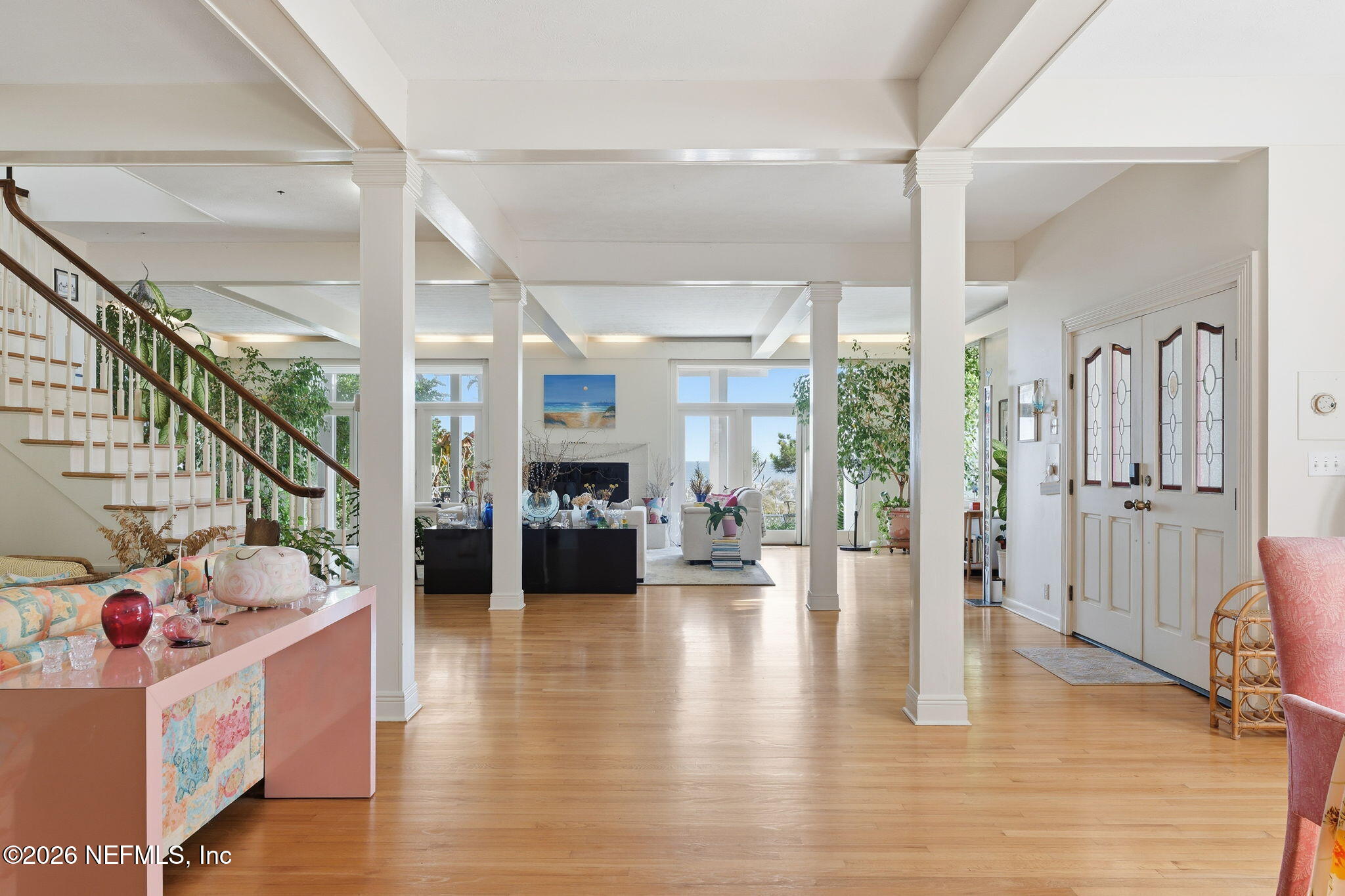 211 Beach Avenue Atlantic Beach, FL 32233 - Photo 29 of 44 a living room with furniture and a wooden floor