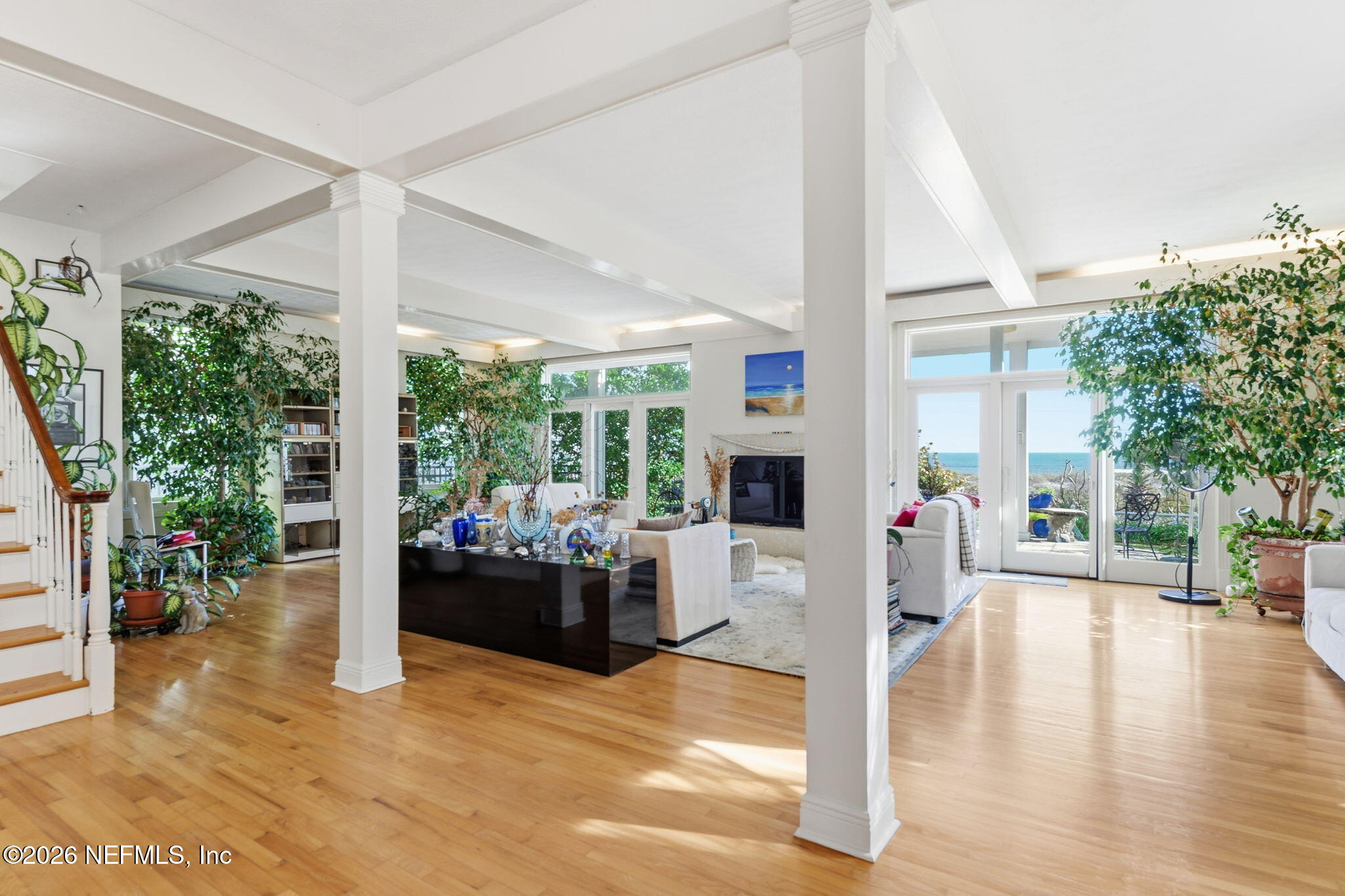 211 Beach Avenue Atlantic Beach, FL 32233 - Photo 30 of 44 a living room with furniture and a large window