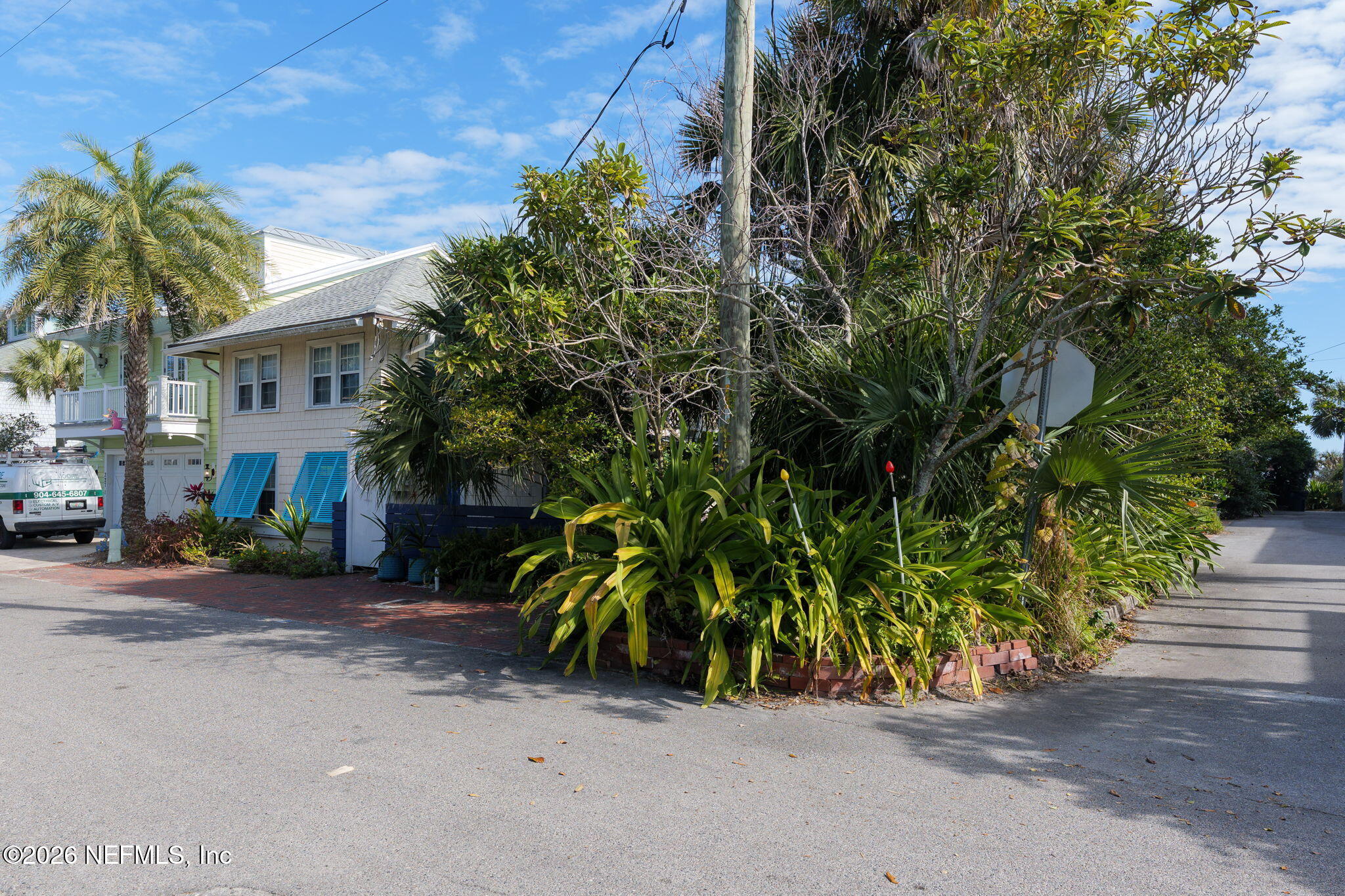 211 Beach Avenue Atlantic Beach, FL 32233 - Photo 9 of 44 a view of a street with a building in the background