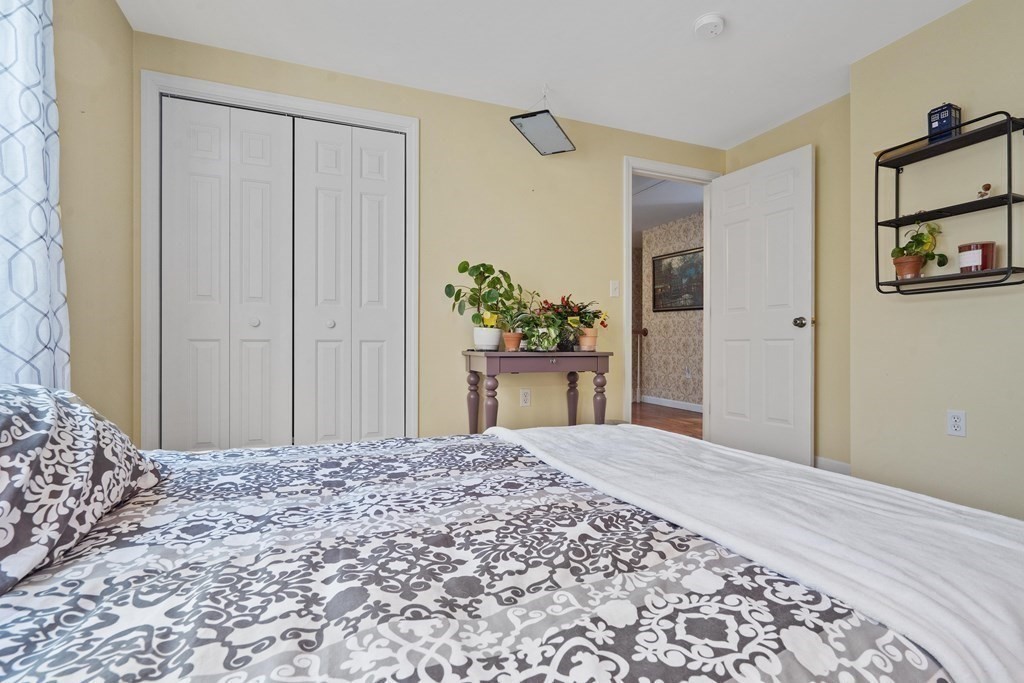 42 Fairview Park Road Sturbridge, MA 01566 - Photo 32 of 41 a bedroom with a bed and a cabinets